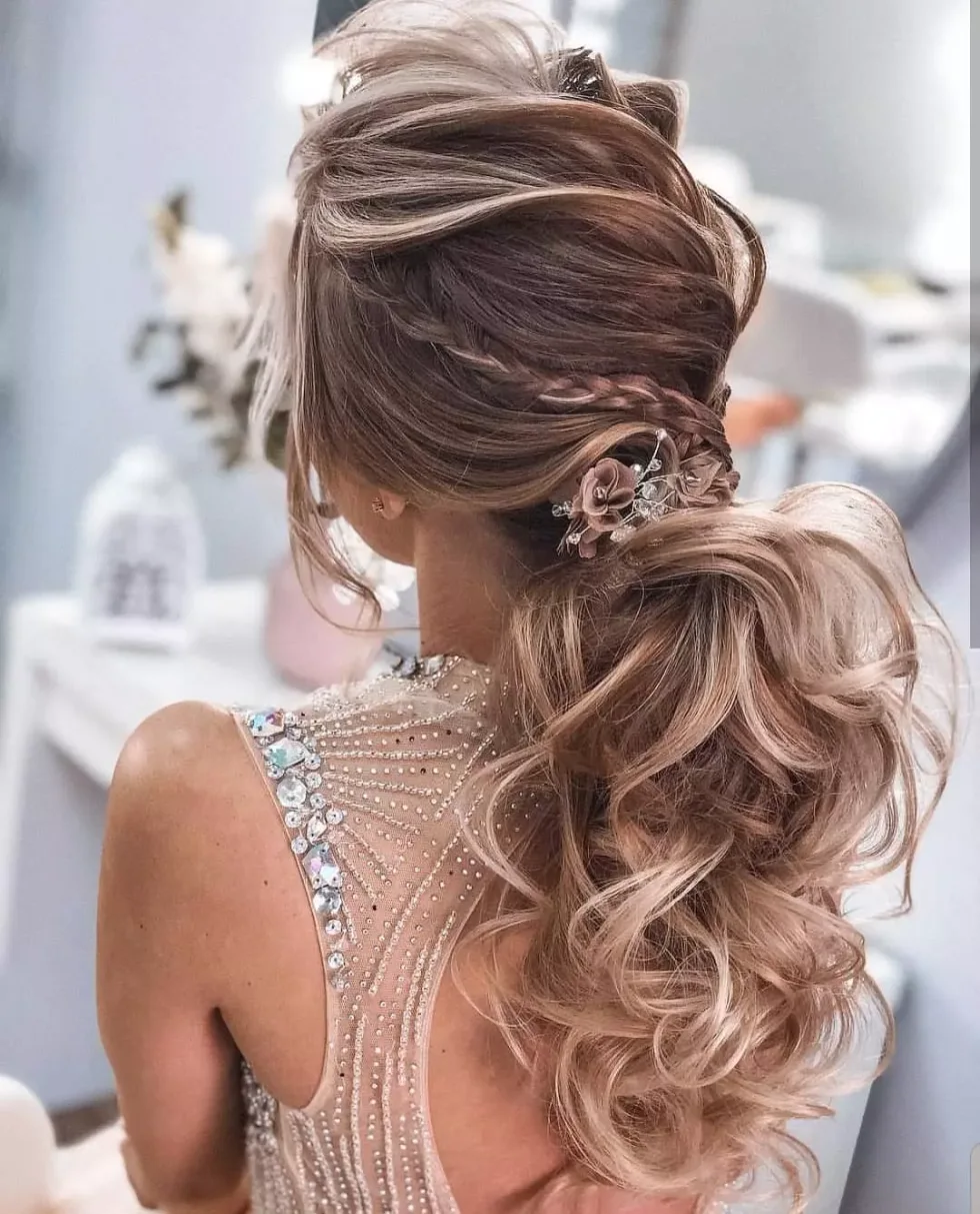 chest straight black ponytail shown as a wedding hairstyles ideas for long hair idea, featuring straight texture
