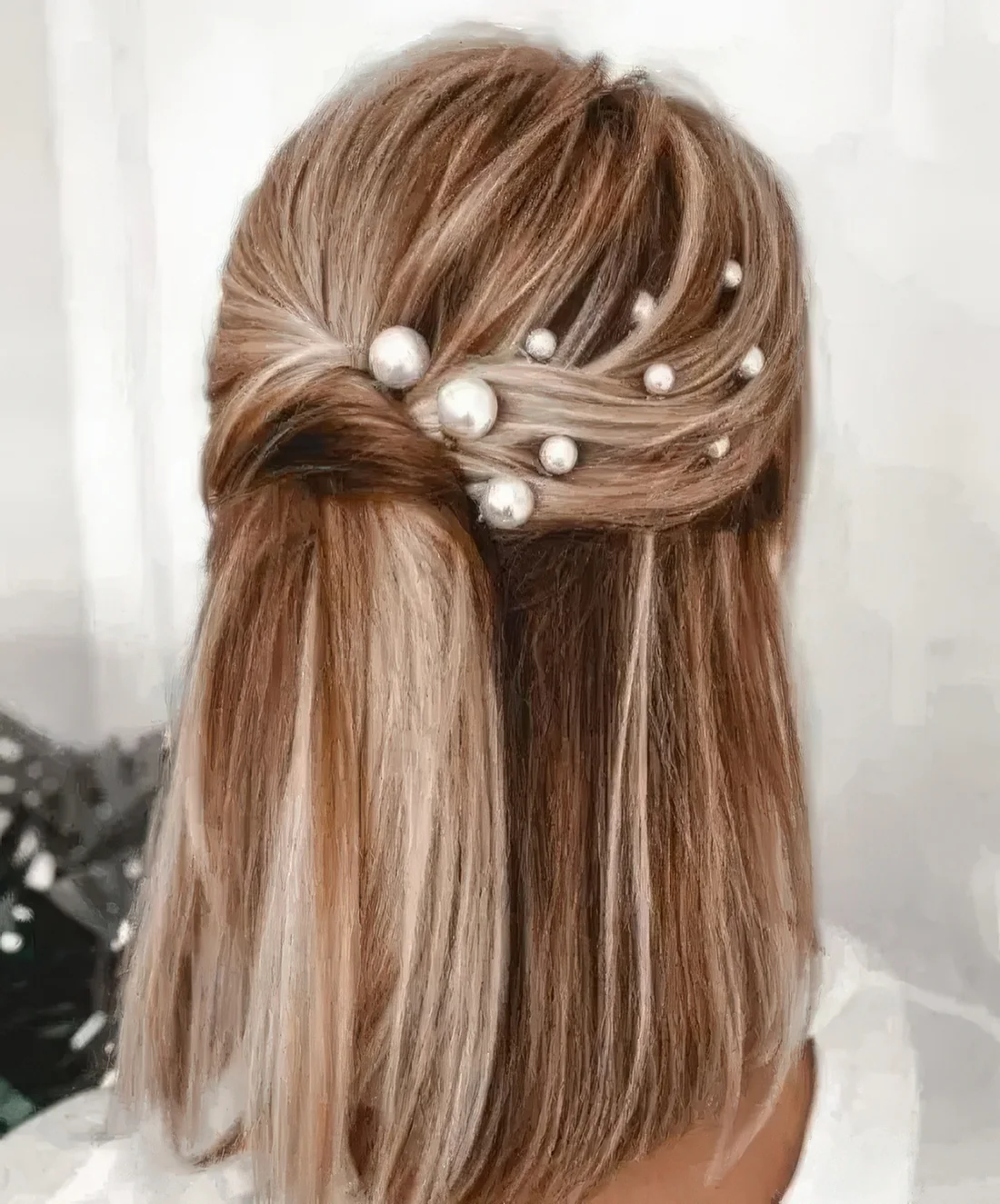 Chic twisted half updo with multiple pearl hair pins and straight hair down.