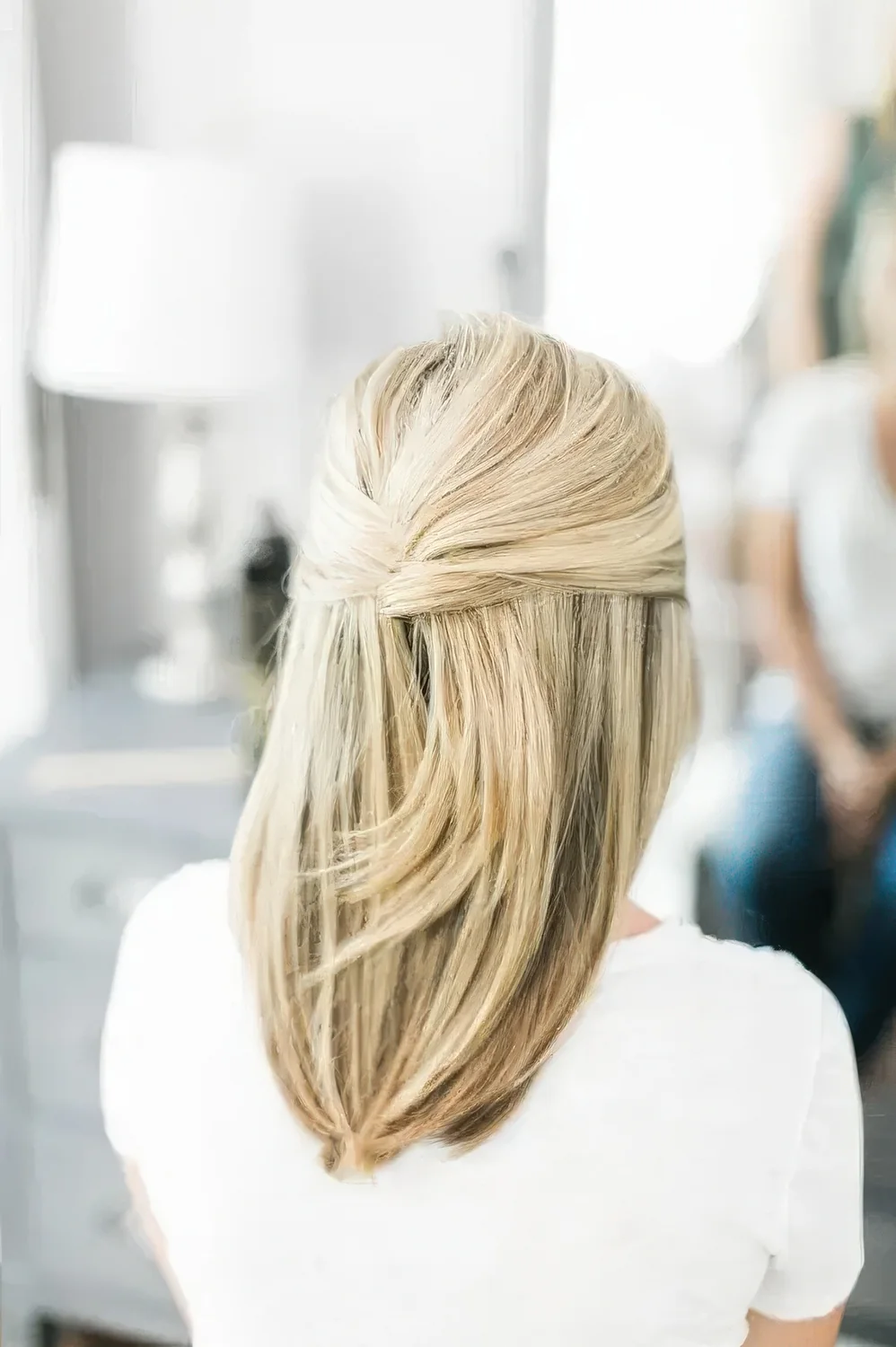 Photo showing french updo, with the hairstyle clearly visible.