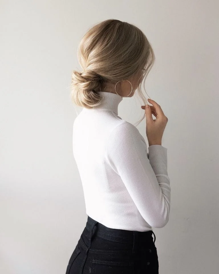 Photo showing knotted bun, with the hairstyle clearly visible.