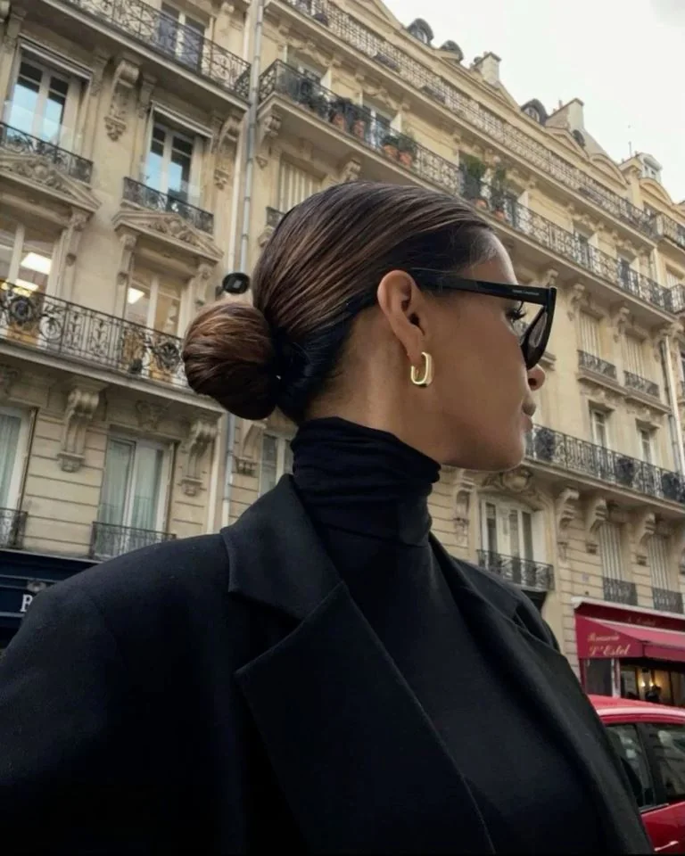Photo showing low bun, with the hairstyle clearly visible.