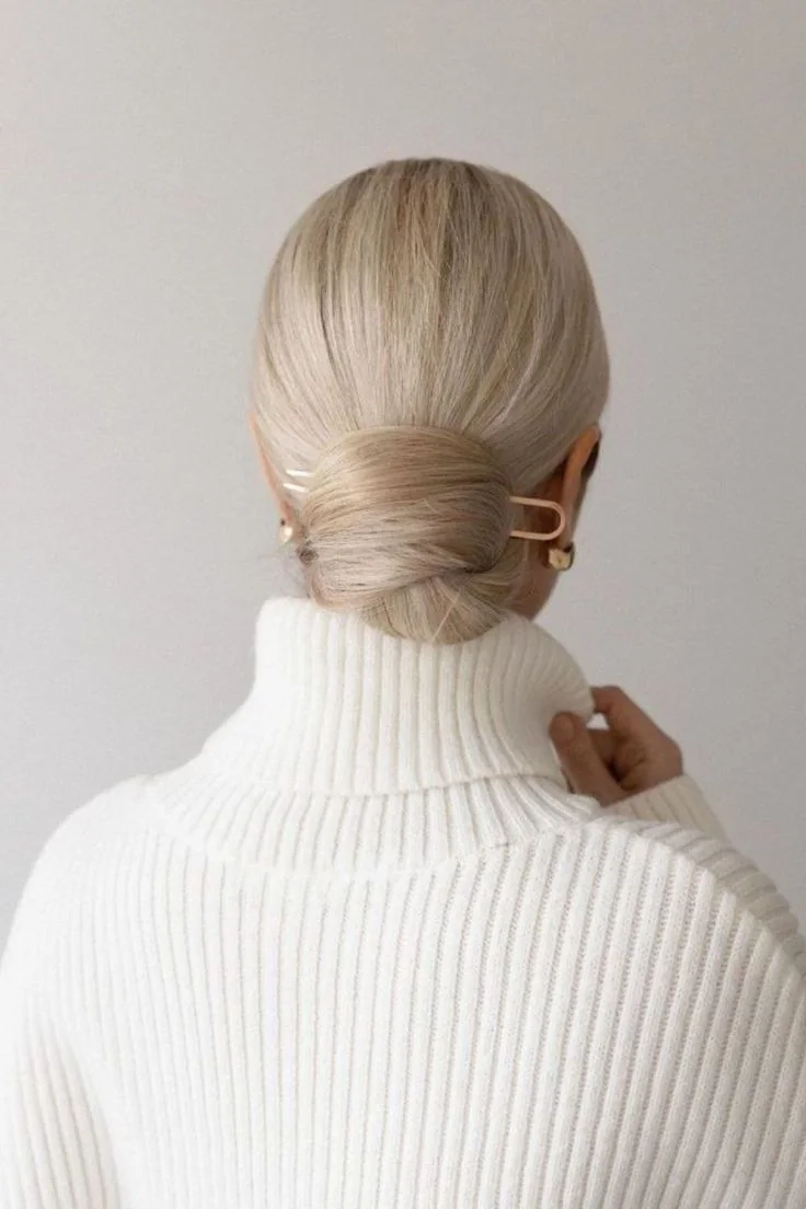 Photo showing big low bun, with the hairstyle clearly visible.