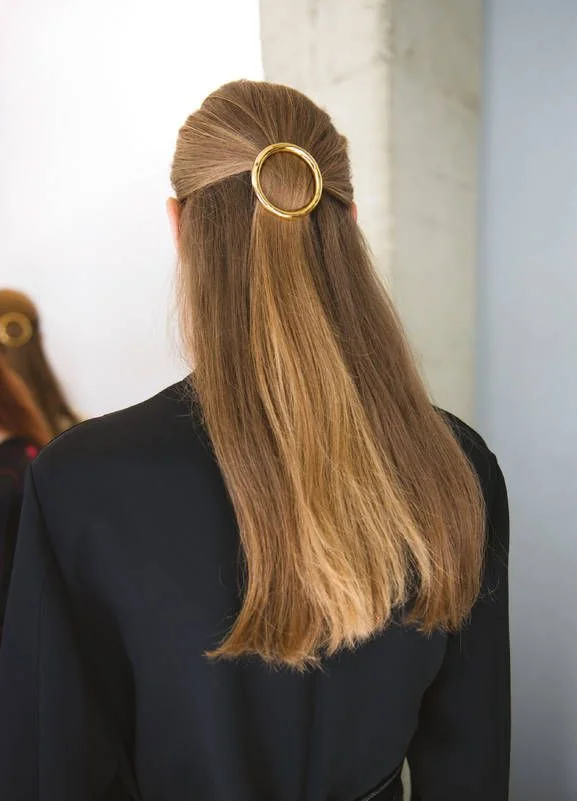 Photo showing half-up hair clip, with the hairstyle clearly visible.