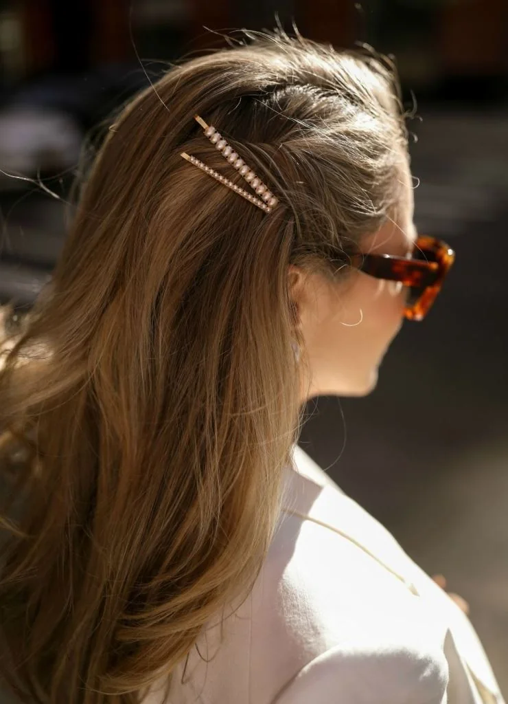 Photo showing half-up hairpins, with the hairstyle clearly visible.