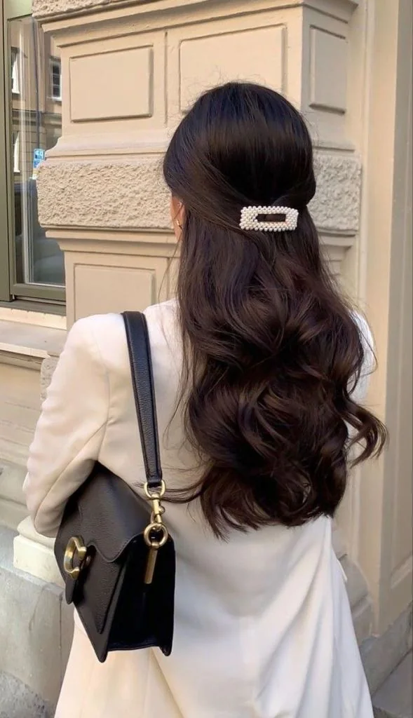 Photo showing half updo pearl, with the hairstyle clearly visible.