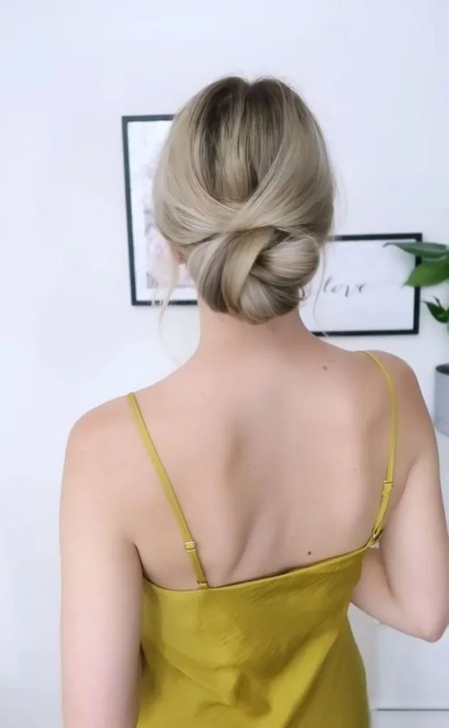 Photo showing updo, with the hairstyle clearly visible.